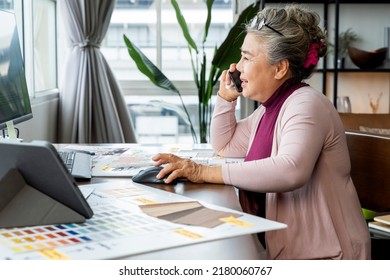 old senior asian femael woman retired people entrepreneur business owner working cheerful at home,home isolation remote jobs work with desktop and smartphone technology device work from home