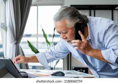 Old Senior Asian Mature Adult Working Hand Use Smartphone And Desktop Busy Business Dealing Contract Proposal At Home Studio,old Man Asia Casual Cloth Busy Meeting Work Remotely Stress Concentrate