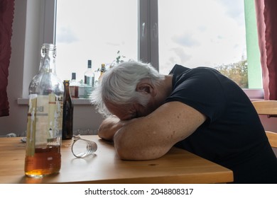 Old Senior Male Man Sit Next To Table Drink Alcohol Bottle At Home Sad Alone Alcoholism Signs And Symptoms Rehab Abuse And Recovery Problems