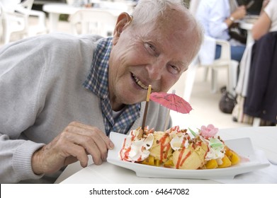 Old Senior Man Enjoying His Sweet Ice Cream Sundae