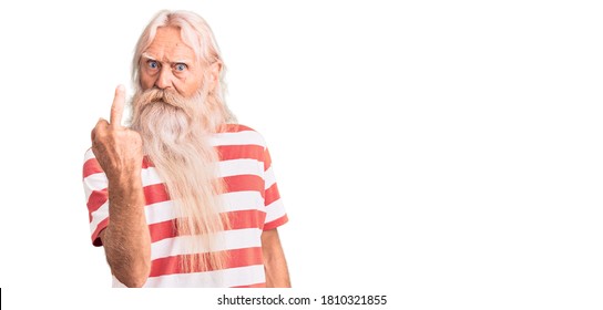 Old Senior Man With Grey Hair And Long Beard Wearing Striped Tshirt Showing Middle Finger, Impolite And Rude  Expression 