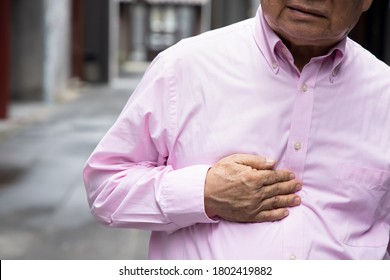 Old Senior Man With Reflux Sickness; Portrait Of Sick Stressed Retired Man With Acid Reflux, Gerd, Indigestion Symptoms; Asian Senior Man Health Care Model