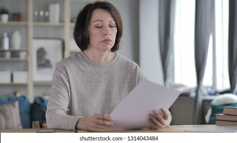 Old Senior Woman Reading Documents, Paperwork