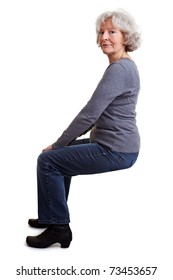 Old Senior Woman Sitting On An Imaginary Chair Or Stool