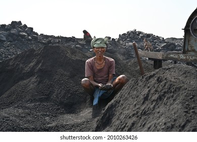 An Old Senior Worker Working In Coal Mine