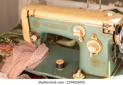 Old Sewing Machine With Pink Tulle