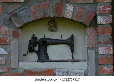 Old sewing machine in the wall