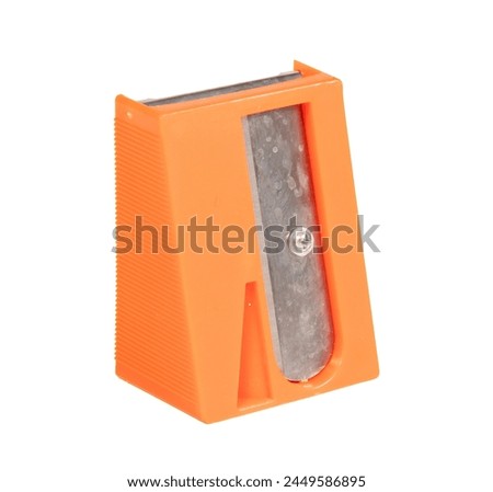 Old sharpner on a white background, used in the kitchen for carrots