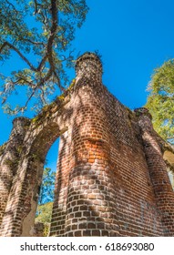 Old Sheldon Church Ruins, originally known as Prince William's Parish Church, amongst majestic oaks and scattered graves, South Carolina, USA