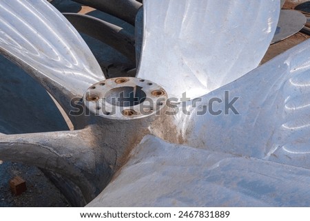 The old ship propeller that have been renovated for reuse with to be sold as second-hand goods