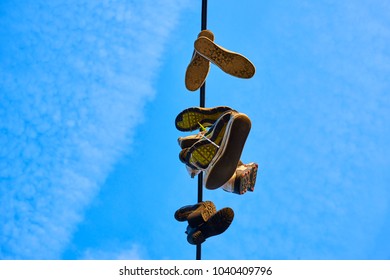 Old Shoes Hanging On Electrical Wire Stock Photo (Edit Now) 1040409796