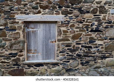 Old Shuttered Windows In Granite Wall Cornwall England Uk