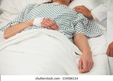 Old Sick Lady Lying In Hospital Bed