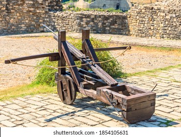 An Old Siege Weapon In The Fortress Walls.