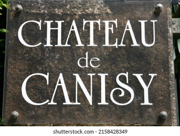 The old sign at the entrance to the chateau, Chateau de Canisy, Canisy, Manche, Normandy, France, Europe on Friday, 20th, May, 2022