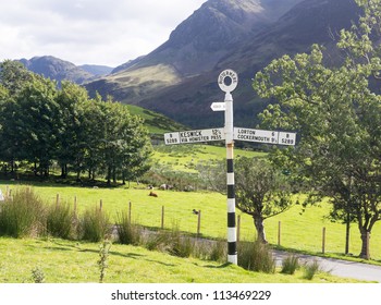 Old signpost near Wrynose Pass in Lake District
