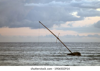 Old Sinking Sailboat In The Pacific Ocean, Hawaii