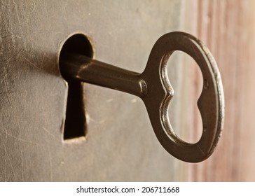 Old Skeleton Key In Keyhole Lock 