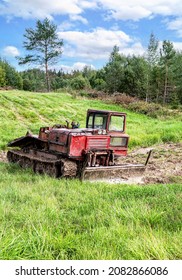 Old skidder at the outdoors in summertime. Skidding machine for timber industry