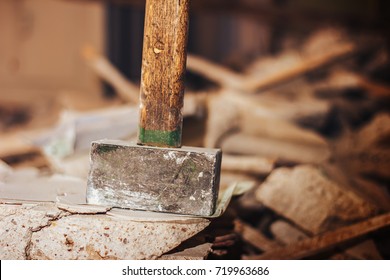 Old Sledge Hammer On Ruins In Flat For Broken Wall