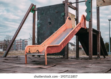 An Old Slide, A Ruined Playground