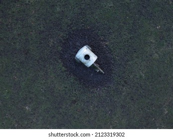 Old Slurry Tank On Meadow