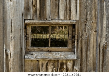 Similar – Rusty window with flower pots