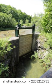 An Old Small Sluice Gate Made Of Wood