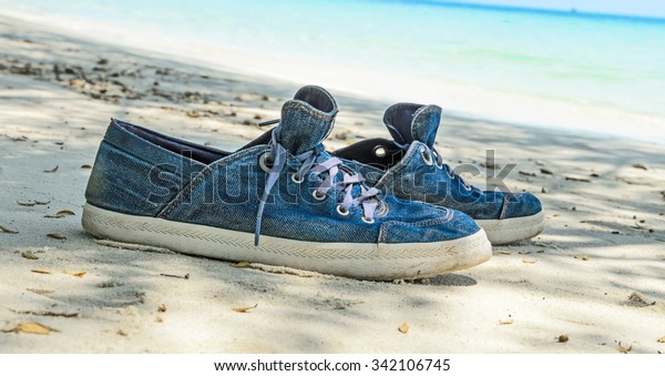 sneakers on beach