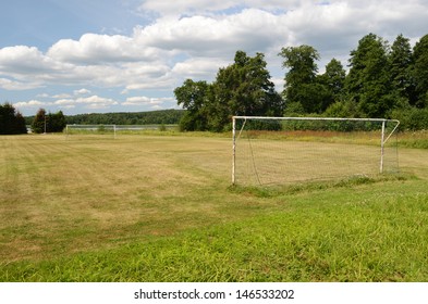 Old Soccer Goal On The Village Sports Field In Summer