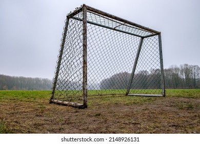 An Old Soccer Practice Goal On A Bad Fall Day. Fog. No People.