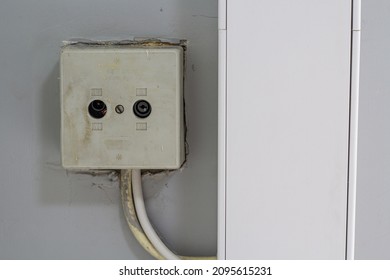 An Old Socket On The White Wall