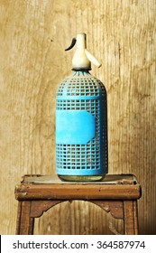 Old Soda Siphon Bottle On Wooden Background 