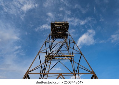 An old Soviet border tower in Neeme against a blue sky. - Powered by Shutterstock