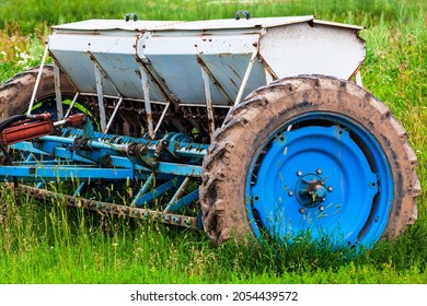 Old Sowing Machine In The Field