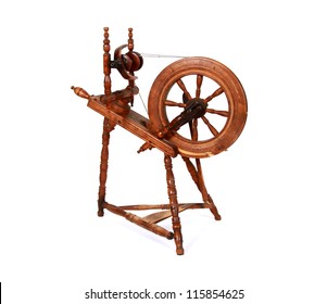 Old Spinning Wheel Isolated On White