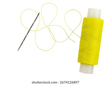Old spool of thread and needle on a white background. Sewing accessories