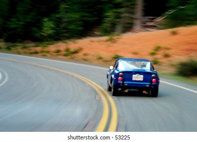 Old Sportscar On A Curvy Road