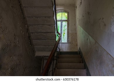 The old staircase in abandoned ruined building, lost places.