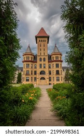 The Old State Hospital Against An Eerie Dark Sky In Fergus Falls, Minnesota USA
