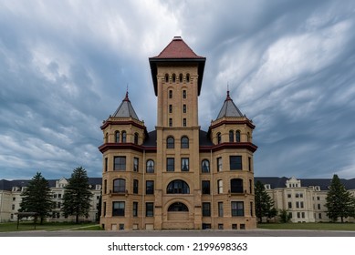 The Old State Hospital Against An Eerie Dark Sky In Fergus Falls, Minnesota USA
