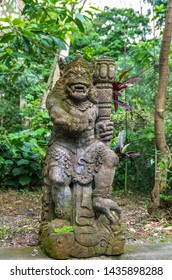 Old statue in Hindu temple in Sacred Monkey Forest, Ubud, Bali, Indonesia