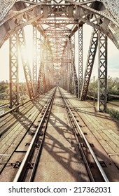 Old steel railway bridge on the river
