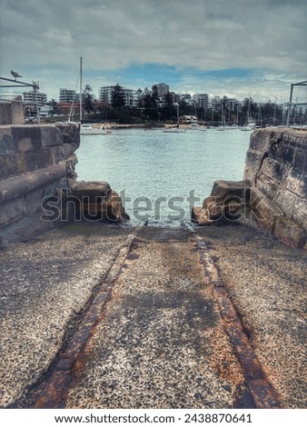 The old steel slipway that makes its way down to the water in Wollongong Harbour.