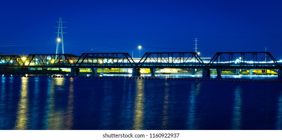 An Old Steel Train Bridge In Tempe, Arizona Reflects The Colors Of The Environment In These Images Of A Photographer's Perspective Looking Up At The Decorative Metal