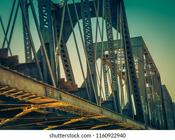 An Old Steel Train Bridge In Tempe, Arizona Reflects The Colors Of The Environment In These Images Of A Photographer's Perspective Looking Up At The Decorative Metal