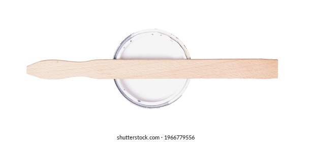 Old stirring stick with a pot of paint, isolated on white