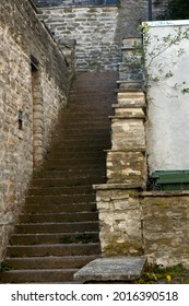 Old stone abandoned staircase in the city. High quality photo