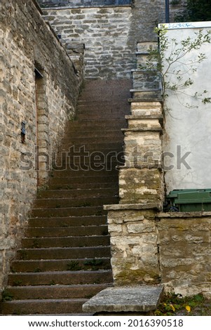 Old stone abandoned staircase in the city. High quality photo