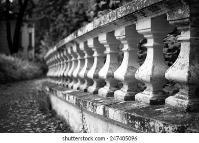 Old stone balustrade in the park closeup